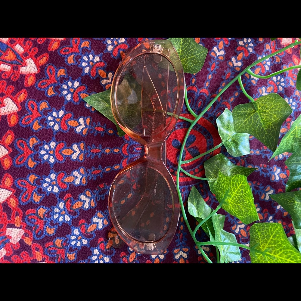 Clear orange oval sunglasses